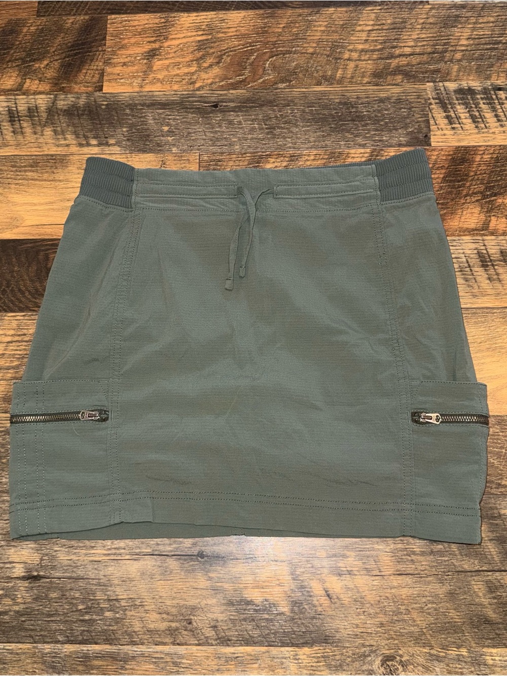Athleta Olive Green Drawstring Mini Skirt with Zip Pockets